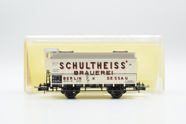 Trix H0 23525 gedeckter Güterwagen mit Bremserhaus (Schultheiss Brauerei) K.P.E.V.