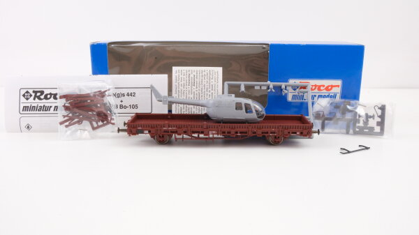 Roco H0 1910 Auto+Waggon Flachwagen mit Ladung (Hubschrauber Bo 105) DB