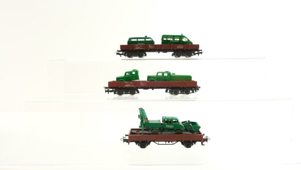 Märklin H0 Konvolut Niederbordwagen mit Ladung (Polizeifahrzeuge)