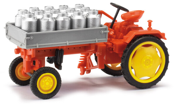 Busch H0 210005001 MH: Traktor RS09 Pritsche + Milchkannen