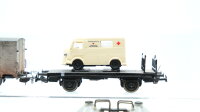 Unbekannt/Lima H0 Konvolut Flachwagen mit Citroen-Transporter "Rotes Kreuz" Gedeckter Güterwagen mit Bremserhaus Silowagen Niederbordwagen mit Bremserhaus und Ladung DR/FS/SNCF