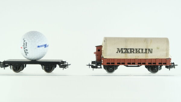 Märklin H0 Konvolut Niederbordwagen mit Plane und Bremserhaus 322,  Flachwagen mit Golfball "secotex P II Tour Elektro Obermeier" Länderbahn