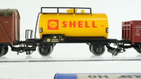 Märklin/Baur H0 Konvolut Gedeckter Güterwagen "Stückgut-Schnellverkehr" Hochbordwagen Niederbordwagen mit Plane "Märklin" Kesselwagen "Shell" Kühlwagen "250 Jahre Stadtbrand Ehingen" DB