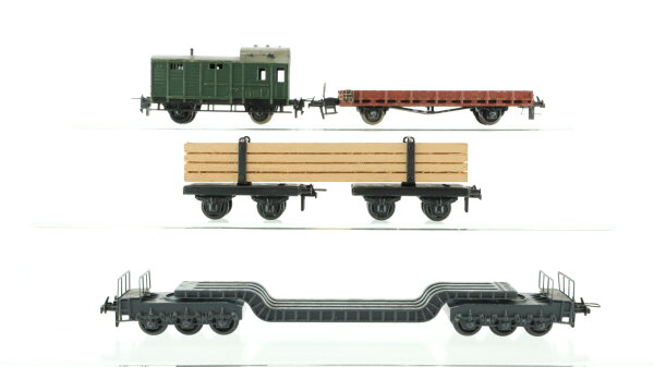 Trix H0 Konvolut Güterwagen 2 x Drehschemelwagen mit Ladung Balken, Tiefladewagen, Niederbordwagen, Güterzugbegleitwagen DB, u.a.