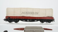 Märklin H0 Konvolut Schwerlastwagen mit Trafo "AEG", Niederbordwagen mit Plane "Märklin", Selbstentladewagen "Erz IIId" DB