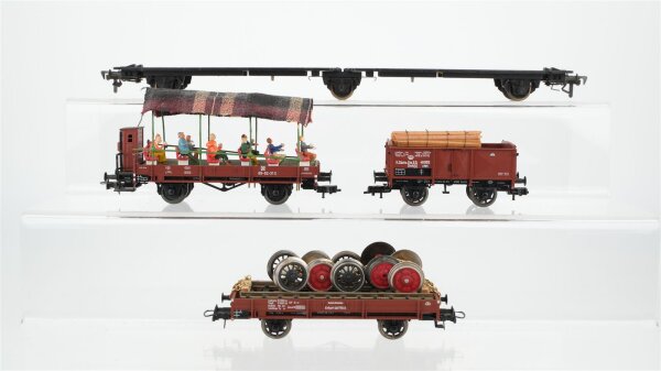Fleischmann H0 Konvolut 1 Flachwagen für Sattelzug 3-achsig, 1 Hochbordwagen, 1 Nieder bordwagen mit Ladung "Radreifen", 1 Niederbordwagen mit Bremserhaus und Figuren (Eigenbau) DR/K.Sächs.Sts.E.B.