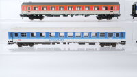 Fleischmann H0 Konvolut Personenwagen "Bistro Cafe" 1.Kl. blau/grau, Speisewagen rot, Abteilwagen 2.Kl. blau/grau, Abteilwagen 1.Kl orange/grau, Personenwagen "Touropa" DB