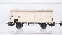 Märklin H0 Konvolut 1 Schotterwagen, 2 gedeckete Güterwagen, 1 offener Güterwagen mit Holzladung und Bremserhaus, 1 Niederbordwagen 2 achsig DB