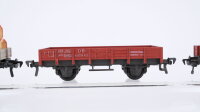 Fleischmann H0 Konvolut 4 Niederbordwagen, 2 Niederbordwagen mit Ladung, 2 achsig DB (1 Trittbrett abgebrochen)
