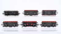 Fleischmann H0 Konvolut 4 Niederbordwagen, 2 Niederbordwagen mit Ladung, 2 achsig DB (1 Trittbrett abgebrochen)