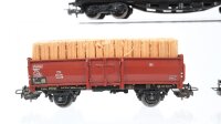 Märklin H0 Konvolut Sebstentladewagen, Hochbordwagen mit Holzladung, gedeckter Güterwagen, Rungenwagen, Niederbordwagen 4-achisg DB (Rungen fehlen)
