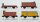 Märklin H0 Konvolut gedeckter Güterwagen "312" braun, Niederbordwagen mit Bremserhaus, gedeckter Güterwagen mit Bremserhaus und Zugschluss "320", Bananenwagen mit Bremserhaus "324 Jamaica" (Beleuchtung ungetestet)