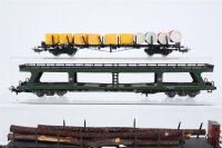 Märklin H0 Konvolut Schwerlastrungenwagen mit Ladung, 2 Drehschemelwagen mit Baumstämmen, Autotransportwagen, Seitenwandschiebewagen DB