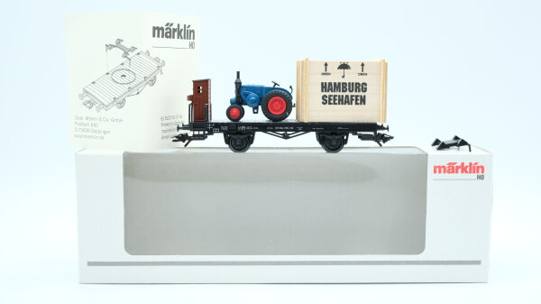 Märklin H0 46843 Flachwagen mit Überseekiste und Traktor  H 10 der DB