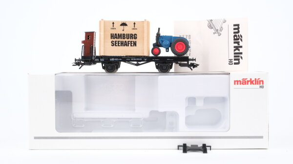 Märklin H0 46843 Flachwagen mit Überseekiste und Traktor  H 10 der DB