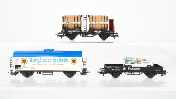 Märklin H0 Konvolut Kühlwagen "Würzburger Hofbräu" Niederbordwagen mit PKW "Krombacher" Weinfasswagen DB u.a.