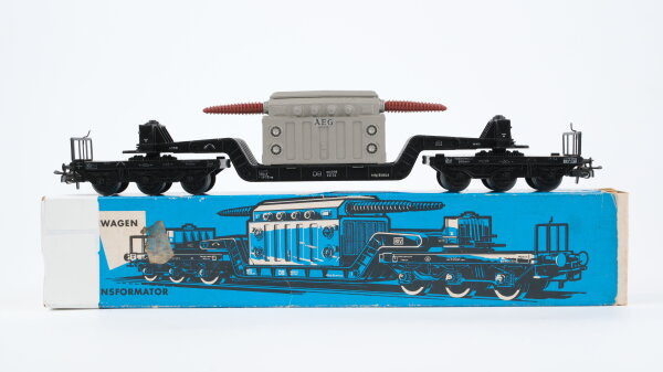Märklin H0 4617 Tiefladewagen mit Transformator (AEG) SST 53  St 52 der DB