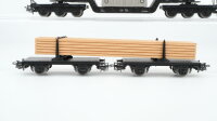 Märklin H0 Konvolut Tiefladewagen teilbeladen mit Trafo "AEG" Langholzwagen DB u.a. (Abbrüche)