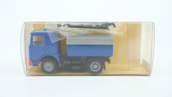 TRUCK-Line H0 7163 MAN Zugmaschine blau mit Ballast-Pritsche/Plane