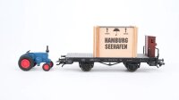 Märklin H0 46843 Flachwagen mit Überseekiste und Traktor  H 10 der DB