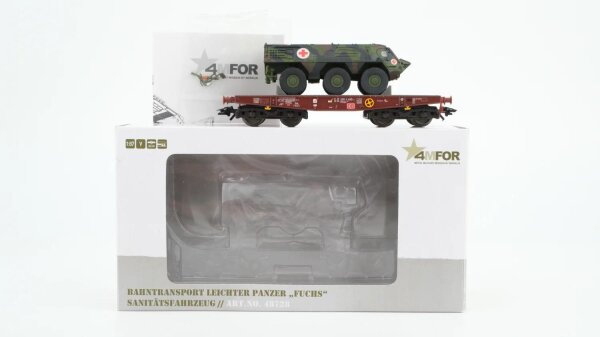 Märklin H0 48728 Schwerlast-Flachwagen mit Transportpanzer Fuchs Rlmmps 651 der DB AG