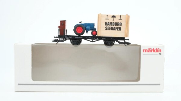 Märklin H0 46843 Flachwagen mit Überseekiste und Traktor  H 10 der DB