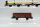 Fleischmann H0 Konvolut Rungenwagen mit Holzstämmen, Hochbordgüterwagen; Gepäckwagen braun; Länderbahnen (17008613)